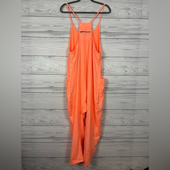 FP Free People Movement Hot Shot Onesie Pastel Peach Orange NWT - Picture 8 of 13